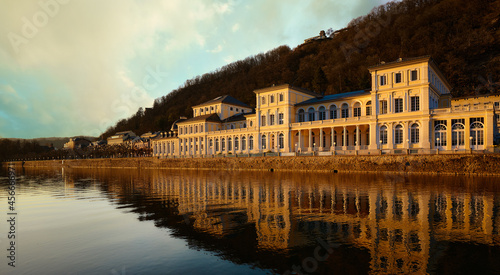 The old German city of Bad Ems. Buildings of classical architecture. View from the river. Evening landscape, sunset ..