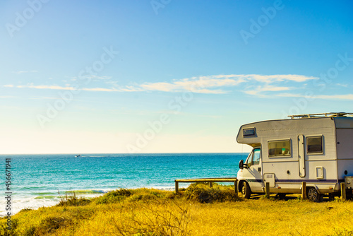 Camper rv camping on sea shore, Spain Fototapet