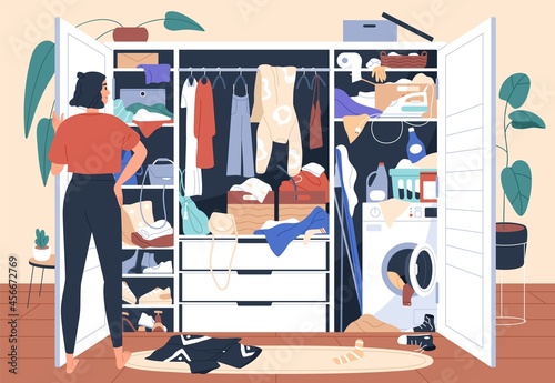 Woman in front of messy untidy wardrobe. Mess and chaos in open closet. Person looking inside cupboard with lot of cluttered, disordered and disorganized clothes storage. Flat vector illustration