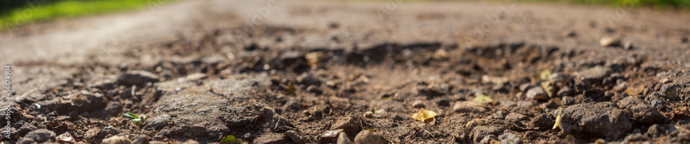 Panorama of a country road with a pit close up Panorama of a country road with a pit close up