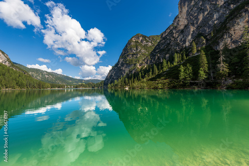 Lago di Braies or Pragser Wildsee, alpine lake and the Mountain peaks of the small and great Apostle, Dolomites, UNESCO world heritage site, South Tyrol, Trentino-Alto Adige, Bolzano, Italy, Europe.