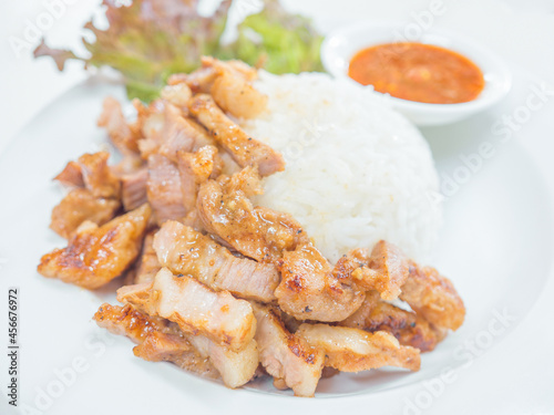 Grilled pork with rice and vegetables Served with spicy sauce