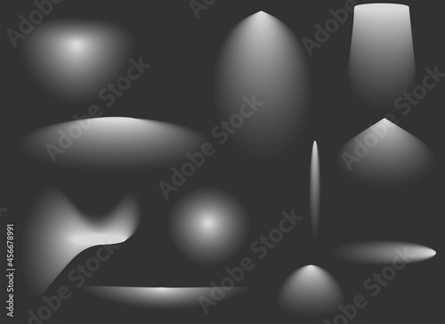 Set of light rays of spotlights. Glowing effects in white. Isolated objects on a dark background. Bright glare, lighting on the stage.Vector illustration.
