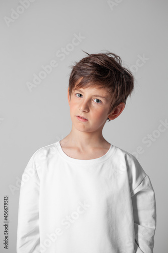 boy in white long sleeve t-shirt © Julie Boro