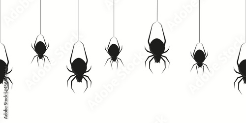 Hanging black spiders. Halloween spidering transparence creepy border with silhouette of scary swing insects seamless decoration
