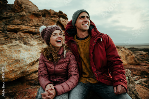 Caucasian male and female laughing together sitting in mountain enjoying the outdoors © Prins Productions