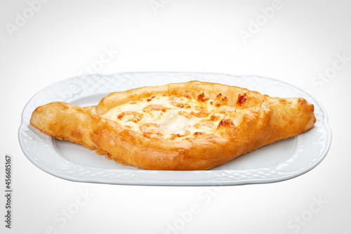 Khachapuri with shrimp and cheese. On a white background