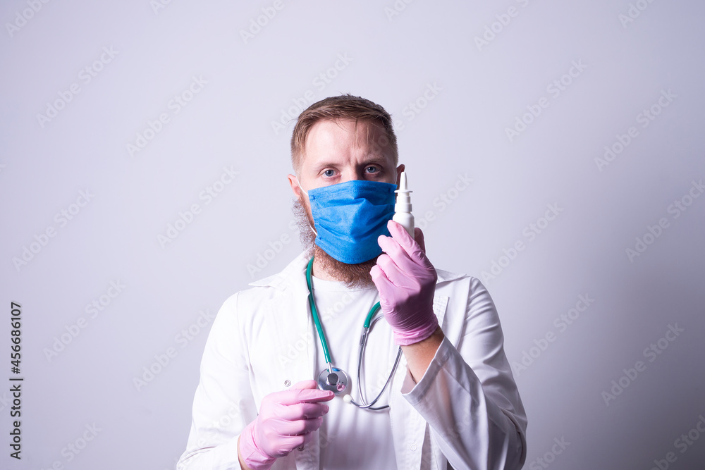 young doctor uses remedy for sore throat young doctor uses remedy for sore throat