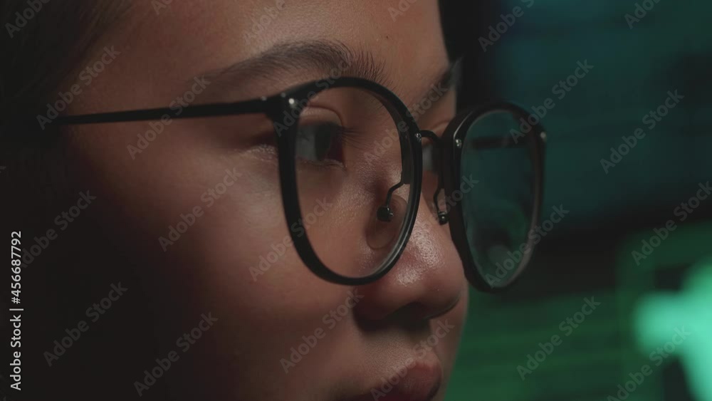 Asian Young Girl Hacker Hacking With Multiple Computer Screens In Dark Room
Asian Young Girl Hacker Hacking With Multiple Computer Screens In Dark Room