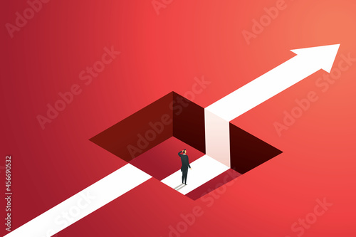 Businessman in a pit on way to goal.