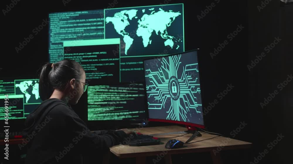 Asian Young Girl Hacker Upset With Lock Key On Computer Screen
