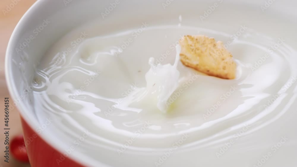 Amazing macro shot of cereals falling in milk Amazing macro shot of cereals falling in milk