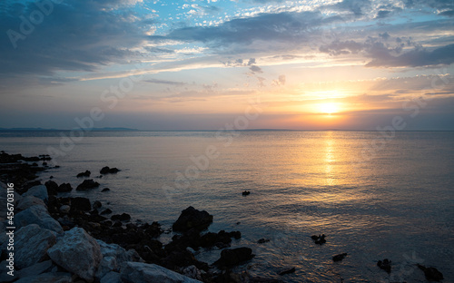 Adriatic coast in the evening. The coastline and water are visible. © Tanya Rozhnovskaya