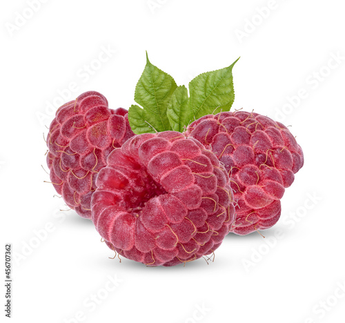 Fresh raspberry with leaves isolated on white background