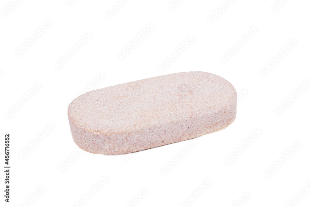 pumice stone , foot scrub stone on a white background close-up