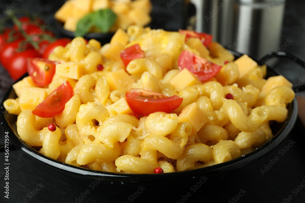 Concept of tasty eating with macaroni with cheese, close up Concept of tasty eating with macaroni with cheese, close up