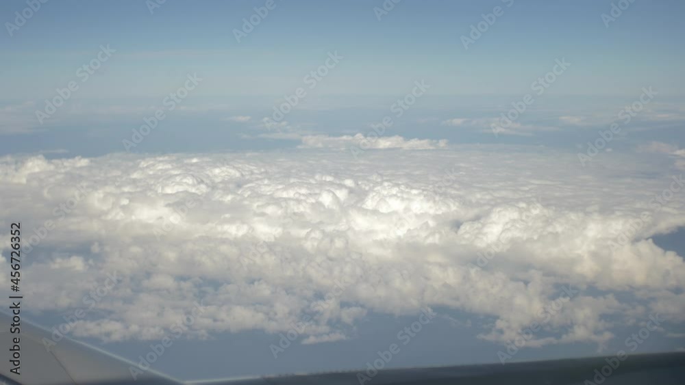 Clouds at sunrise. view from a airplane window Clouds at sunrise. view from a airplane window