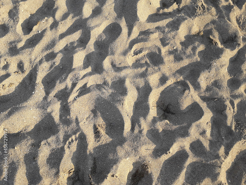 Sand on the beach with footprint