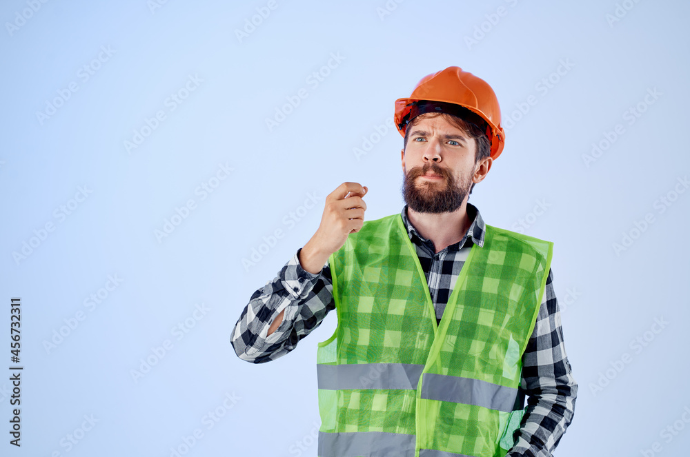 emotional man in orange hard hat construction professional isolated background