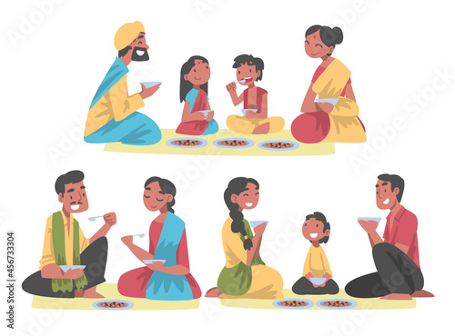 Indian Family with Little Kids Sitting on the Floor Having Meal Together Vector Set