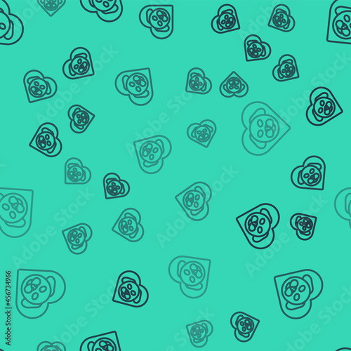 Black line Heart with dog icon isolated seamless pattern on green background. Pet paw in heart. Love to the animals. Vector