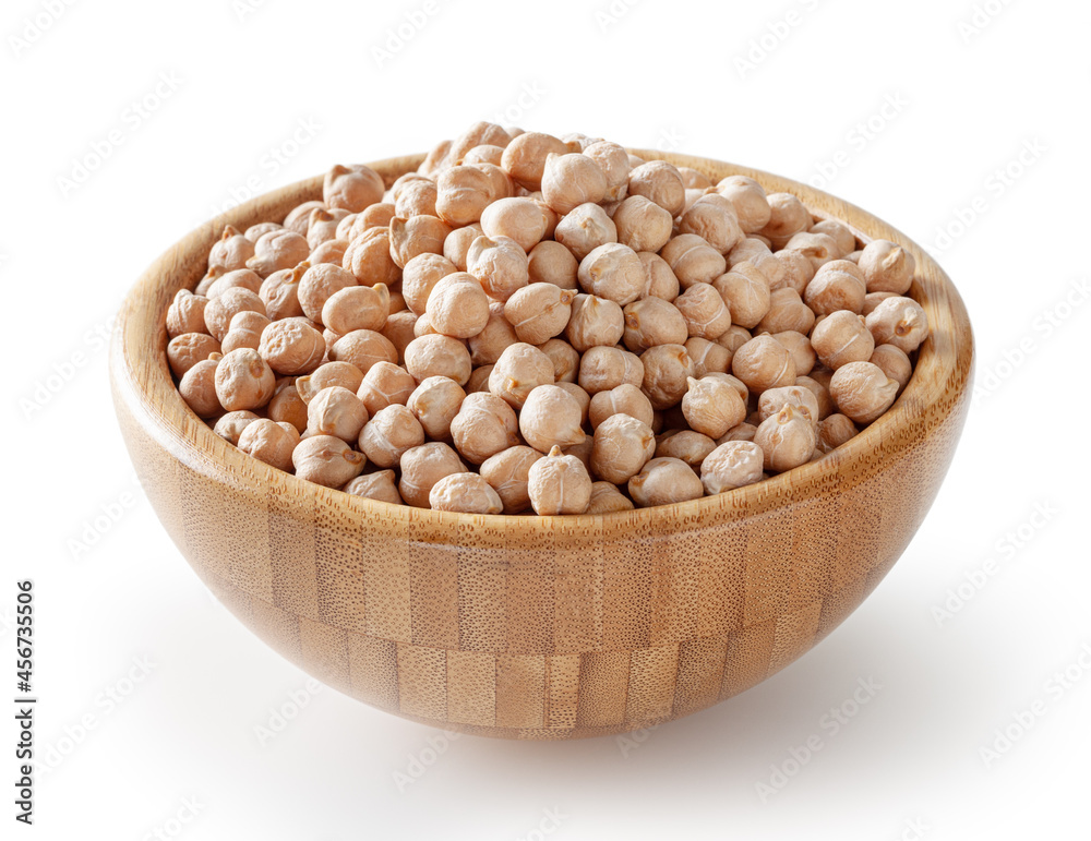 Uncooked chick pea in wooden bowl isolated on white background with clipping path