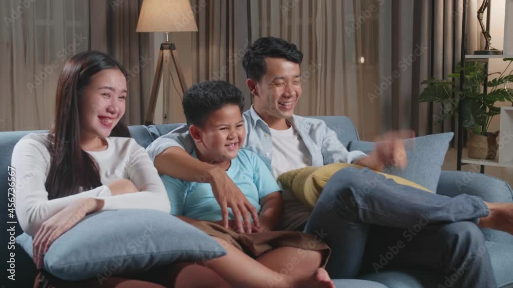 Asian Family, Leisure And People Concept - Happy Smiling Father, Mother And Little Son Watching Tv At Home
Asian Family, Leisure And People Concept - Happy Smiling Father, Mother And Little Son Watching Tv At Home