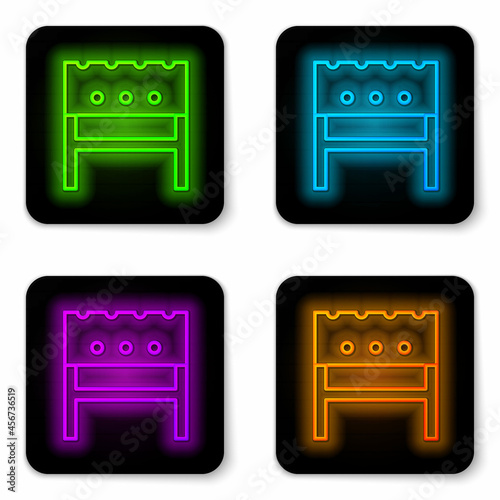 Glowing neon line BBQ brazier icon isolated on white background. Black square button. Vector