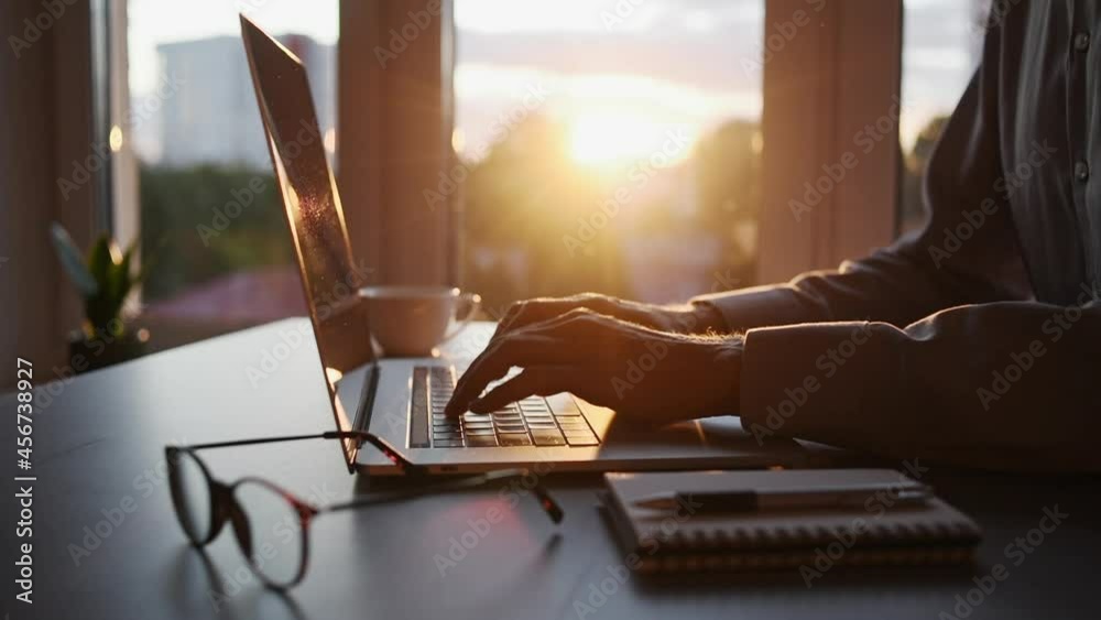 Businessman using laptop computer in office. Young man student working at home. Online learning,  internet marketing, business studying, working from home, online education, web conferencing concept.