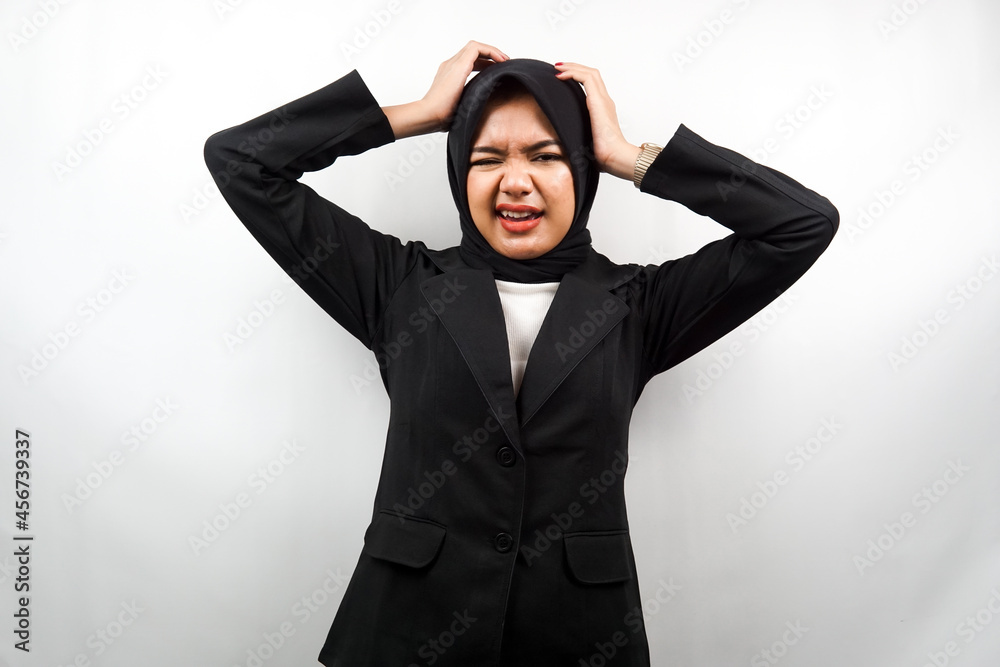 Beautiful young asian muslim business woman stressed, shocked, dizzy, unhappy, many problems, want solution, with hands holding head isolated on white background Beautiful young asian muslim business woman stressed, shocked, dizzy, unhappy, many problems, want solution, with hands holding head isolated on white background
