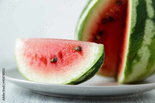 Waterelon, honey watermelon on wooden table background. photo