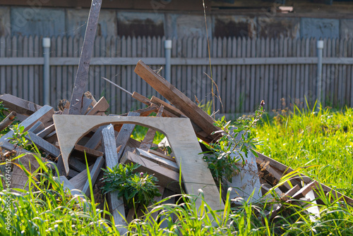 Obraz na plátně construction of a dacha: a large pile of unnecessary construction debris and saw