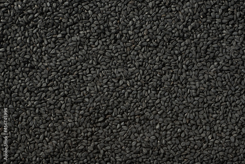food background of kalonji seeds, top view