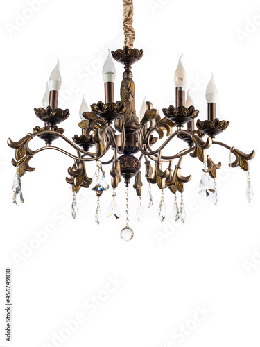 dark with black color chandelier with decorations hanging on a white background