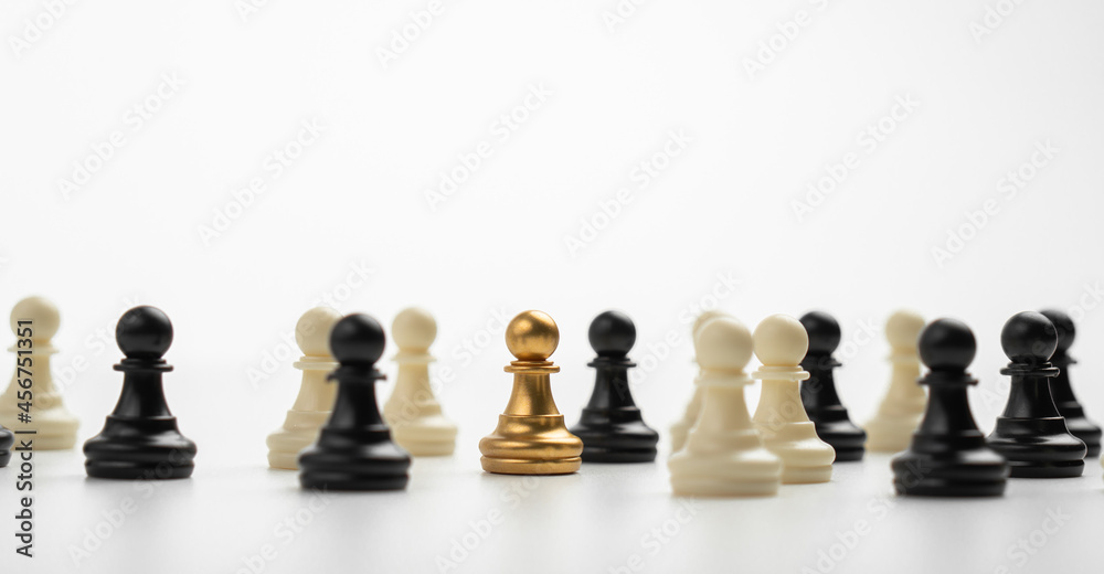 Golden Chess pawn standing to Be around of other chess, Concept of a leader must have courage and challenge in the competition, leadership and business vision for a win in business games Golden Chess pawn standing to Be around of other chess, Concept of a leader must have courage and challenge in the competition, leadership and business vision for a win in business games
