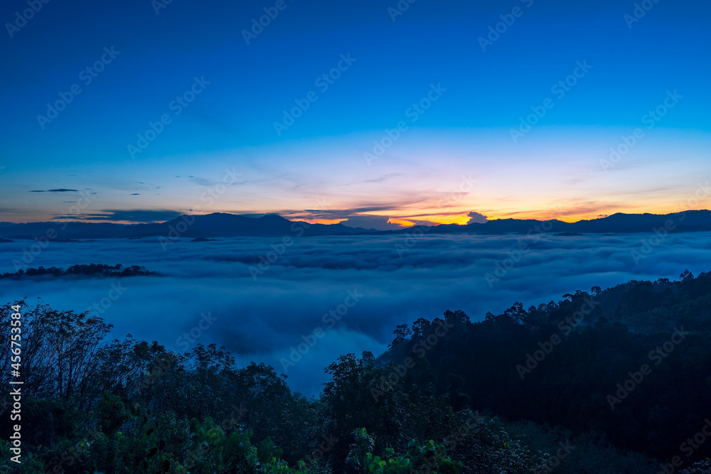 Amazing scenery Nature landscape nature view Aerial view drone camera photography of Mist or fog flowing on Mountain peak in the morning sunrise or sunset At Khao Khai Nui Phang Nga Thailand