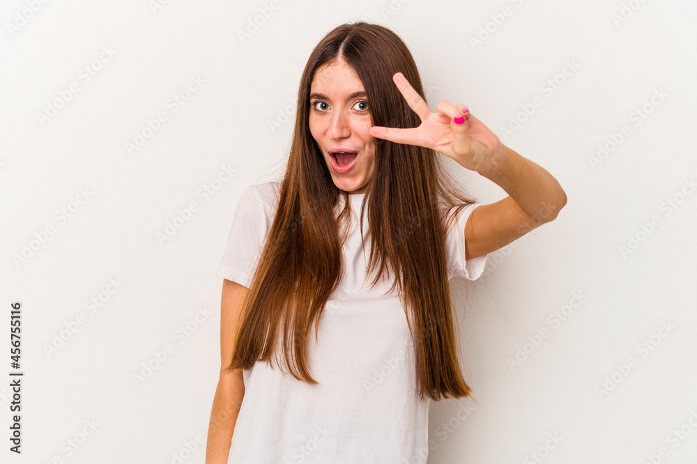 Fototapeta premium Young caucasian woman isolated on white background dancing and having fun.
