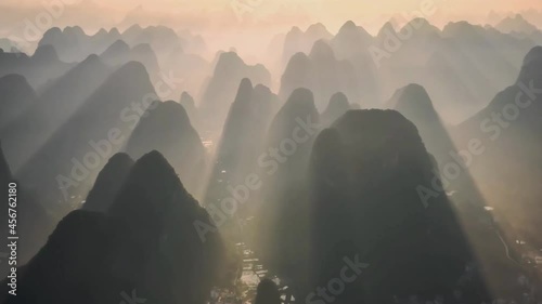 Beautiful aerial view at sunset of Guilin landscape, Li river and karst mountains. Located near Yangshuo County, Guilin City, Guangxi Province, China. photo