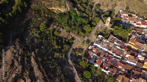 aerial view of mountain bike race on roads in the historic area of sagunto