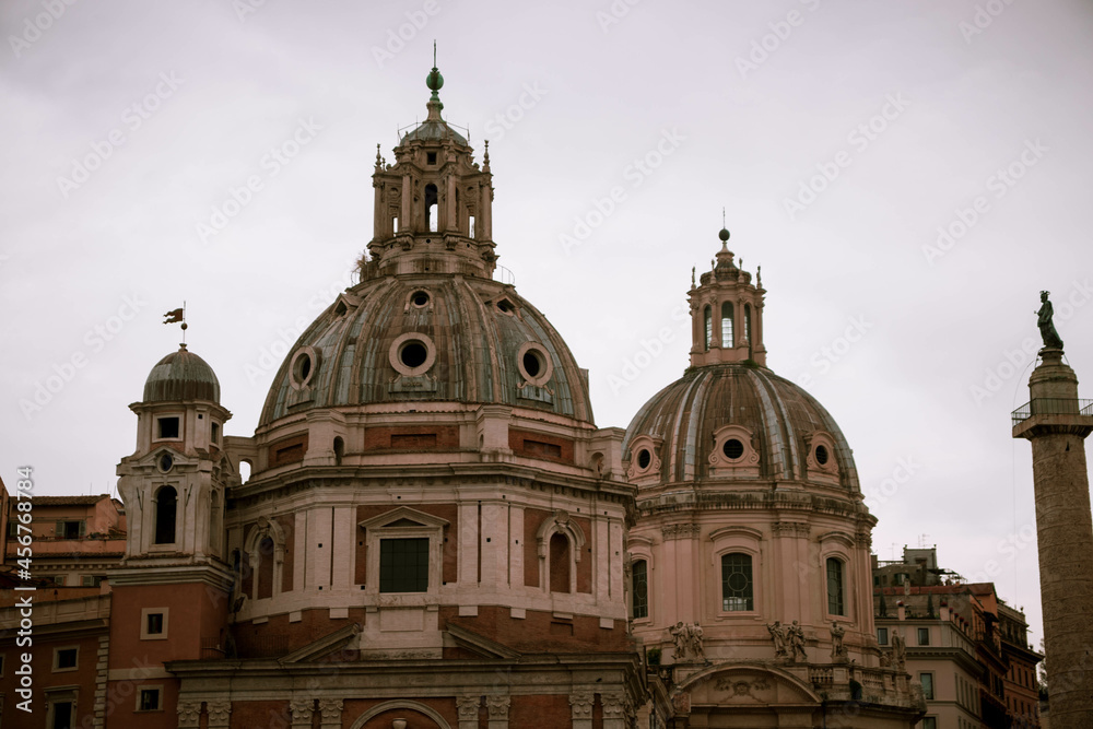 Cupolas of Italian churches with a cloudy sky