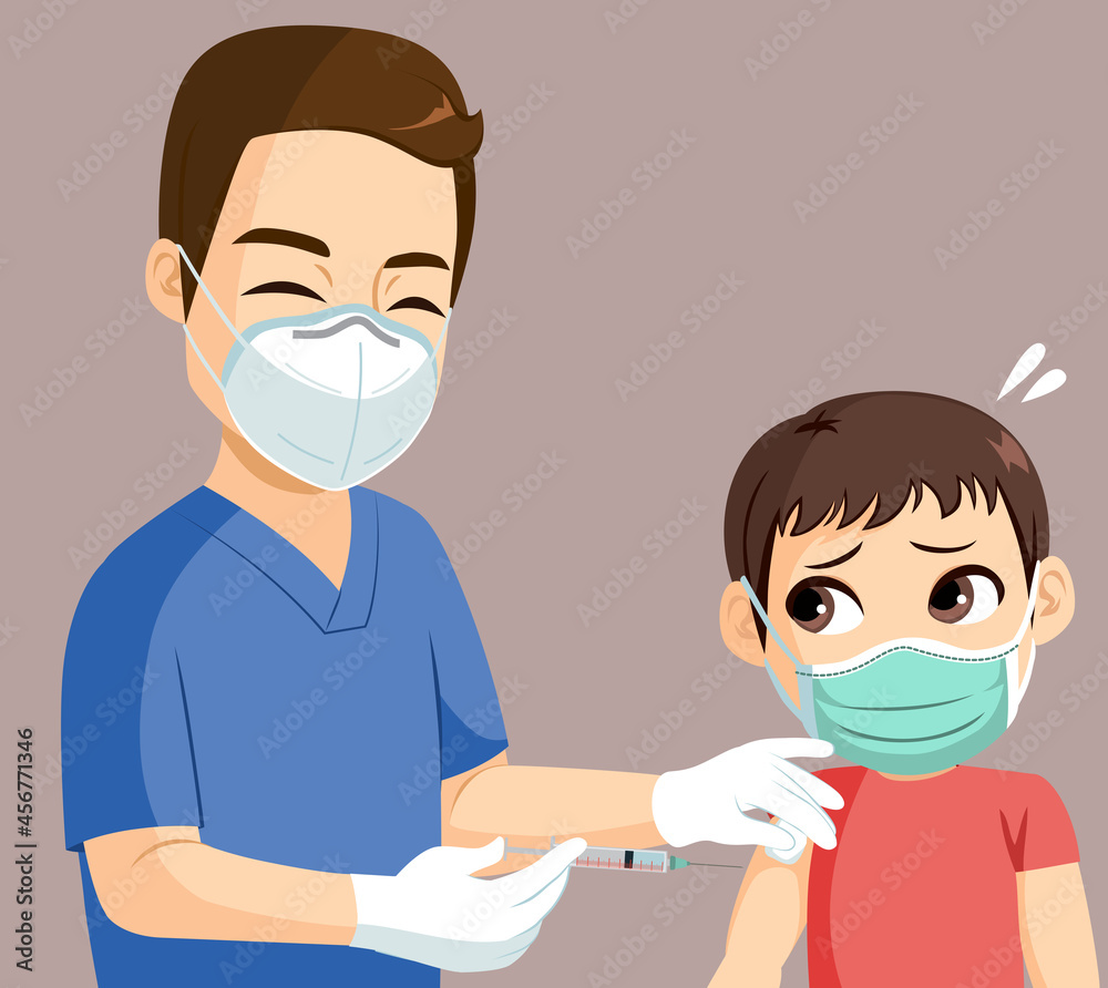 Little kid wearing face mask being vaccinated with Coronavirus vaccine applied by male nurse with syringe Little kid wearing face mask being vaccinated with Coronavirus vaccine applied by male nurse with syringe