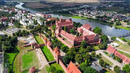 Aerial view on Malbork on the Nogat river, the largest medieval brick castle. photo