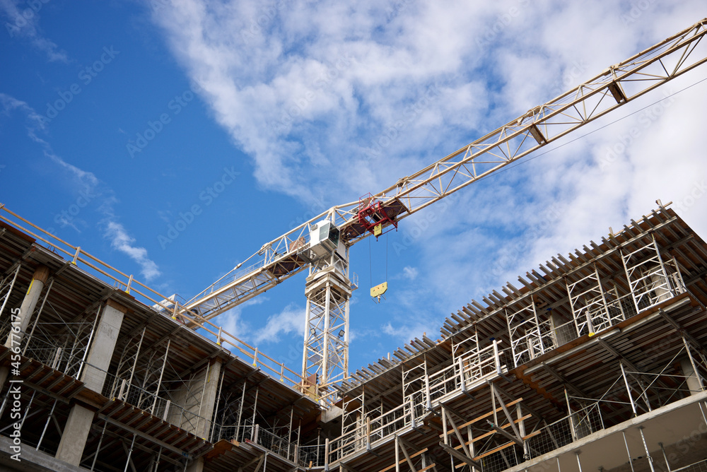 Construction site with cranes and buildings