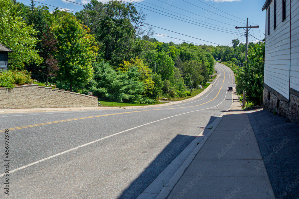 Highway through the township of Rosseau in the district of Parrysound , Ontario, Canada