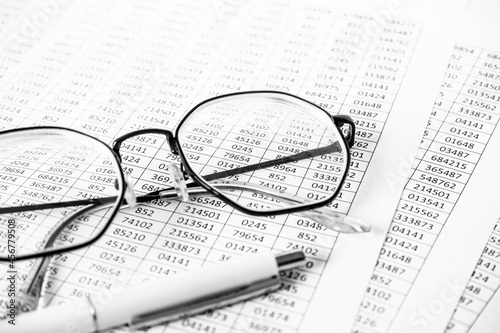 Financial Image Of Some Tax Forms With Glasses And A Pen. Business concept. Accounting report  estimate.