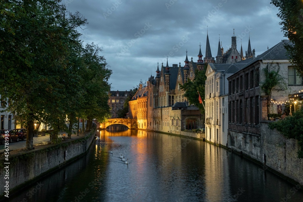 Bruges, Belgium. September 30, 2019: Arched bridge in the canals of Bruges.