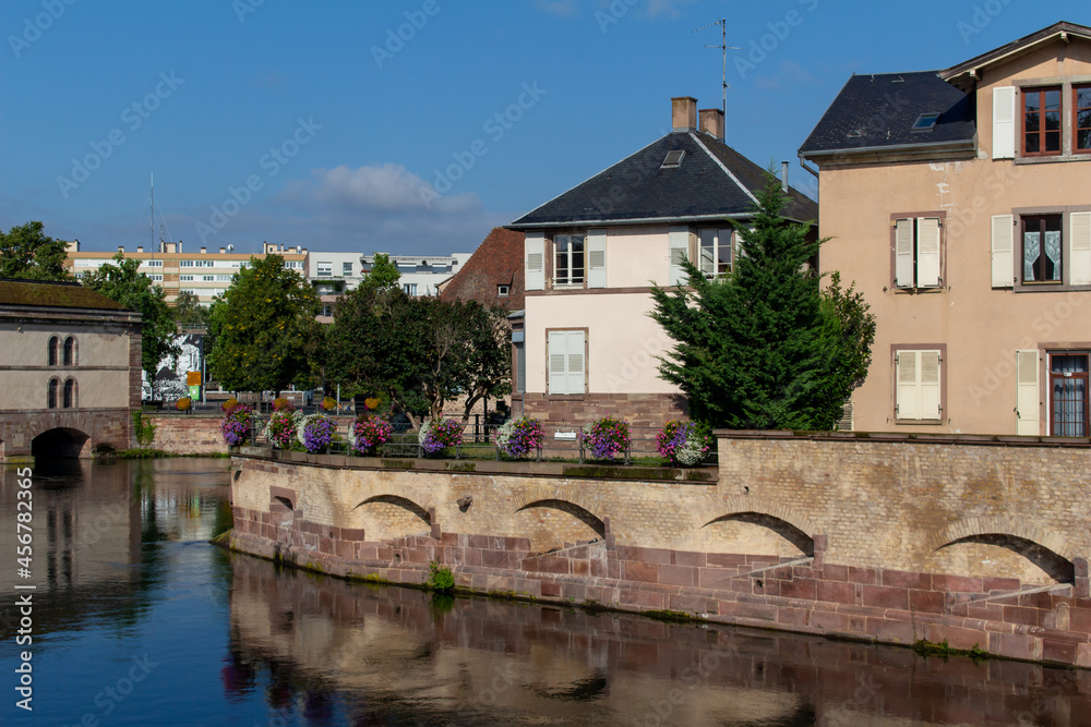 Beautiful view of the Barrage Vauban, a defensive city dam structure on ...