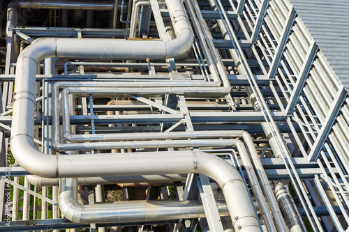 Abstract view of a set of pipelines running through a liquefied gas production plant.