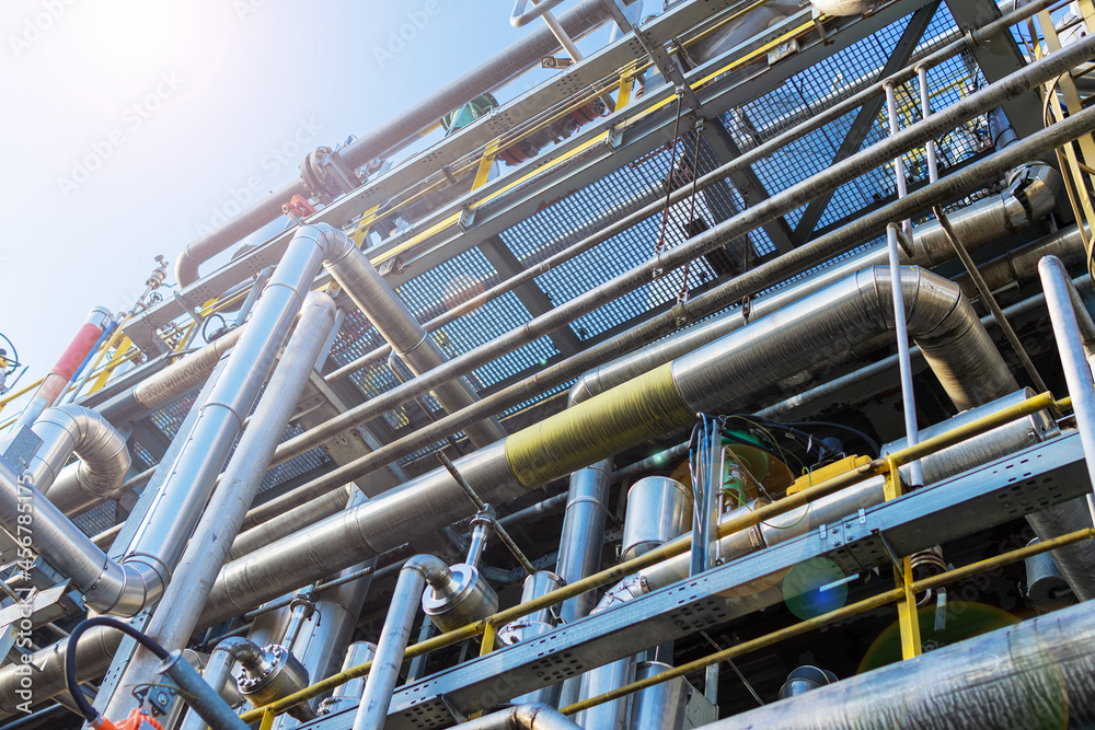 Abstract view of a set of pipelines running through a liquefied gas production plant. Abstract view of a set of pipelines running through a liquefied gas production plant.