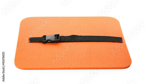Orange foam seat mat for tourist isolated on white